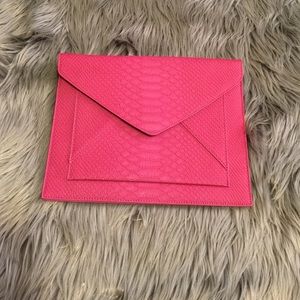 Cranberry snakeskin textured envelope clutch