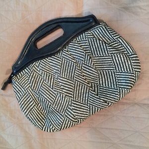 Retro black and white woven clutch