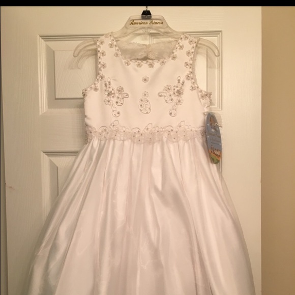 White dress w/ decretive beads never worn