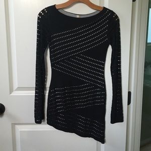 Black asymmetrical body con dress