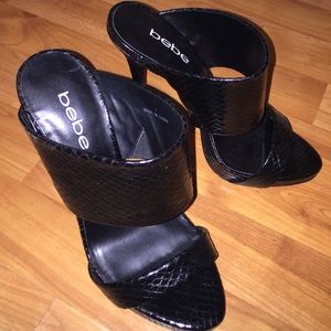 Like new Bebe mules size 7 black