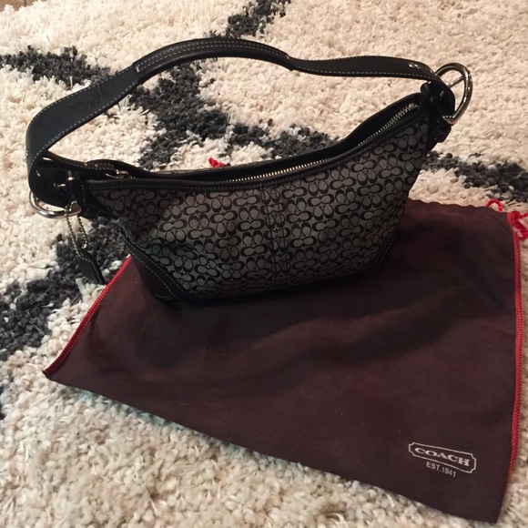 Authentic Coach purse with black C's