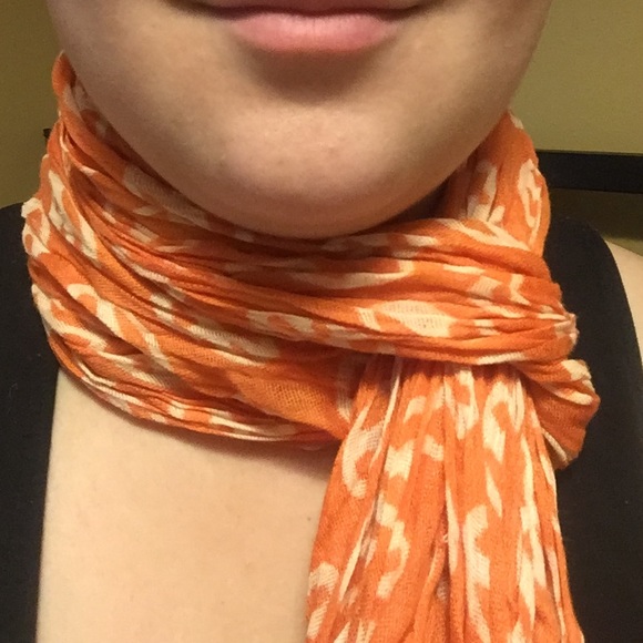 Long orange and white peace sign scarf