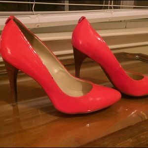 Bright orange Calvin Klein pumps