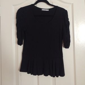 Mikarose black peplum top. Medium