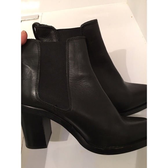 Top Shop black heeled leather booties.