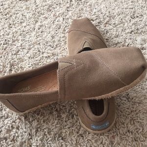 Brand new Toms suede slip ons.