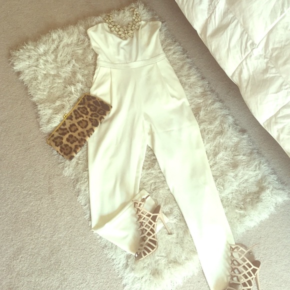 All white with black back detailing jumper