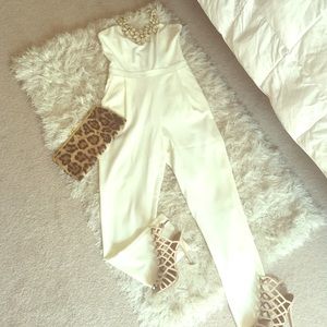 All white with black back detailing jumper