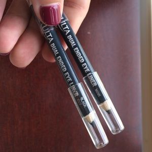 Three dual ended eyeliner sticks.