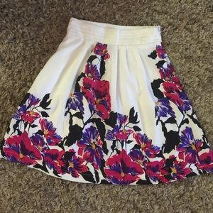 Francesca's white floral print skirt.