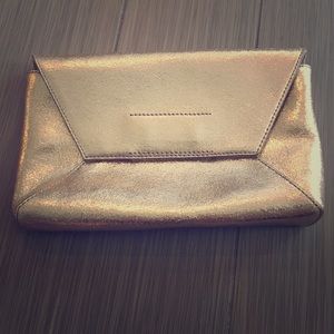 Never worn jcrew metallic gold purse! New with tag