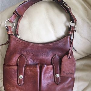 Gorgeous Dooney & Bourke Vachetta Lucy Saddle bag