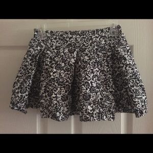 Pleated print miniskirt