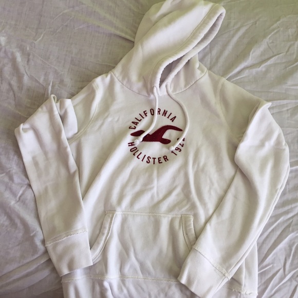 White Holister hoodie with logo on front