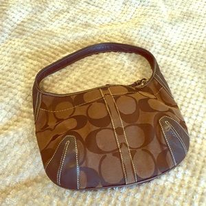 Brown leather and canvas Coach purse