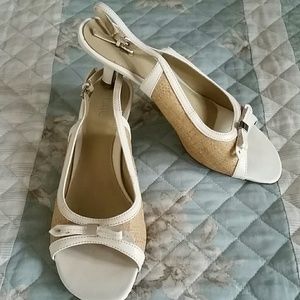 Cute white and tan sandel heels.