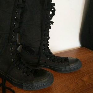 Solid black knee-high converses