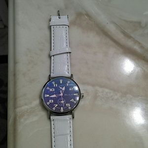 White band blue face watch