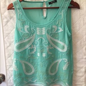 beaded and sequined sleeveless blouse