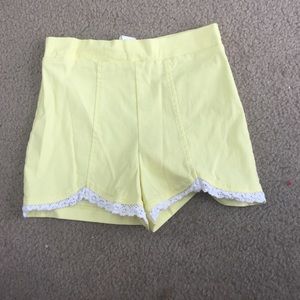 High waisted yellow shorts