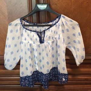 Blue and white shirt that flows
