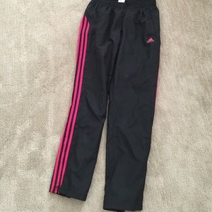 Black with pink stripe adidas wind pants