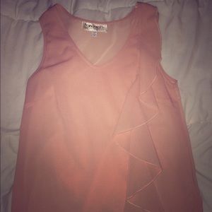 pink ruffled tank top