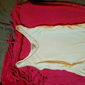 White tank with ruching on sides.