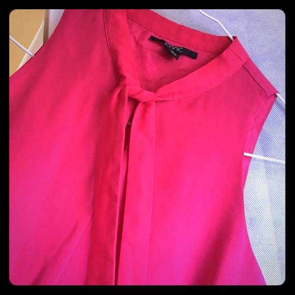 Pink sleeveless blouse