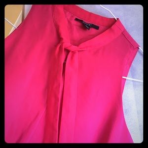 Pink sleeveless blouse