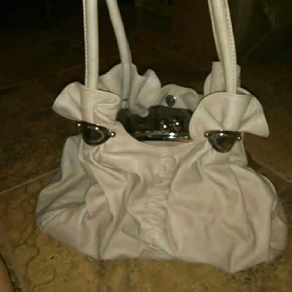 Tan and silver purse