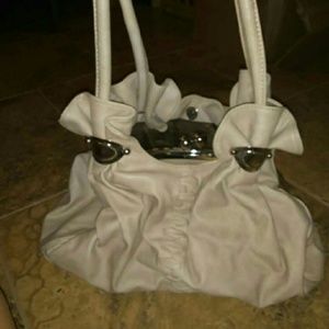 Tan and silver purse