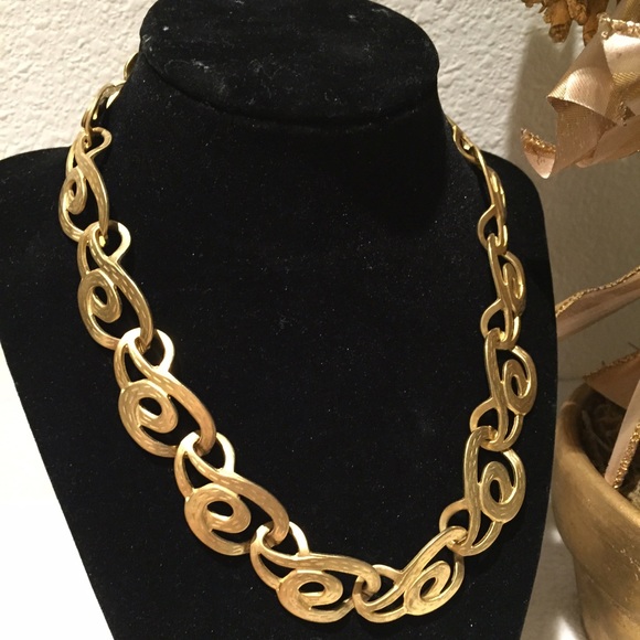 Intricate hammered design necklace