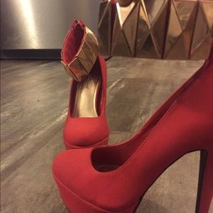 Red heels with gold strap