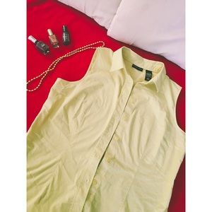 Yellow sleeveless blouse