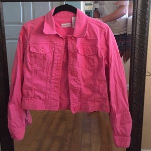 Pink denim jacket.