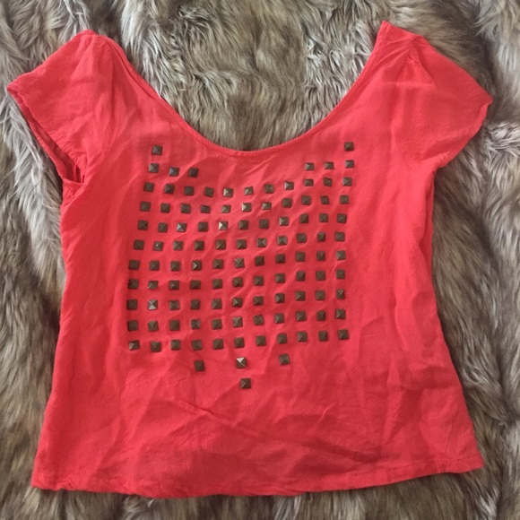 Bright top with stud detail in front & button back