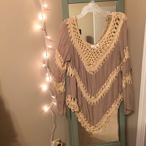 Umgee brand cream colored top.