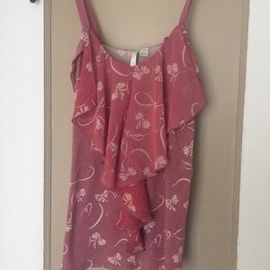 Preowned blouse made by Lauren Conrad . Bow print.