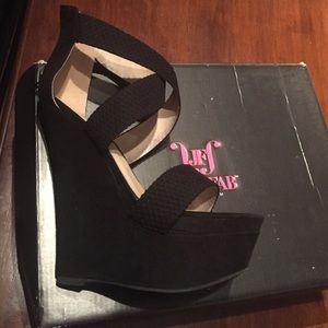 Black wedges - New in box. Never worn.