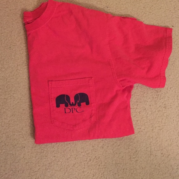 T-shirt by Dixie peaches couture.