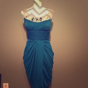 Teal party dress with jewel neckline