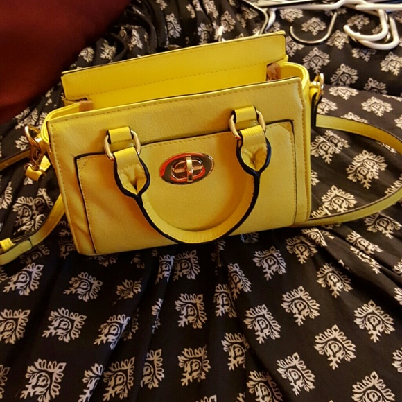 Charming Charlies yellow crossbody bag