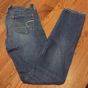 Distressed AE Skinny Jeans