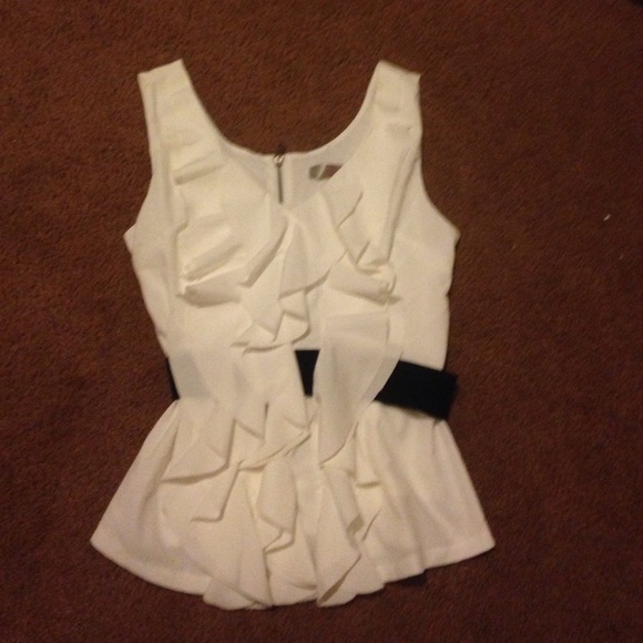 White blouse with black belt