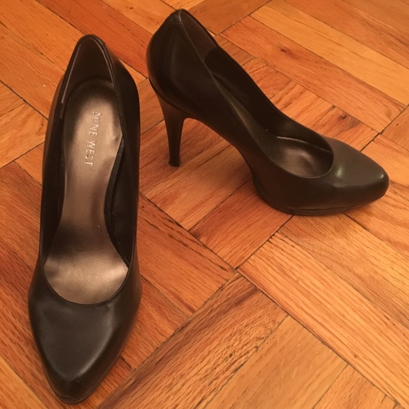 Black leather pumps