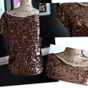 Brown sequined shirt.