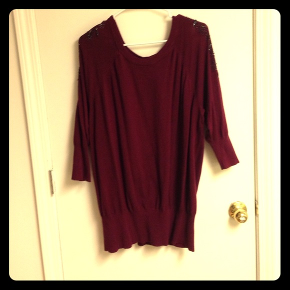 Maroon cold shoulder sweater with beading detail