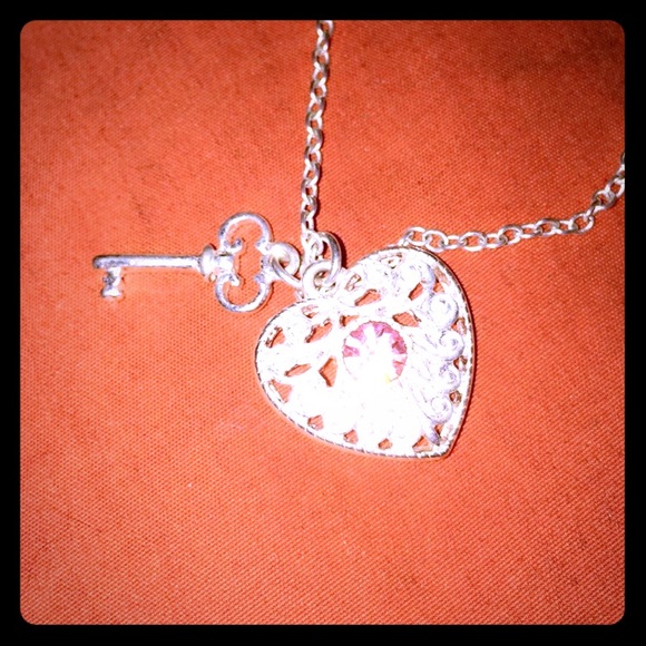 Heart and key necklace.